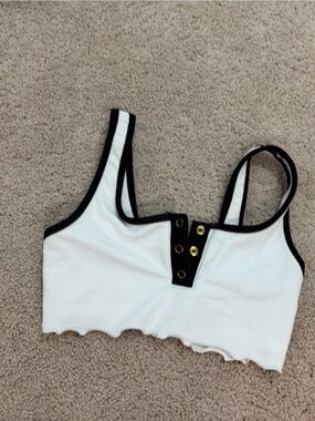 dance top. White Ribbed Top with Black Trim and Gold Eyelets. like new